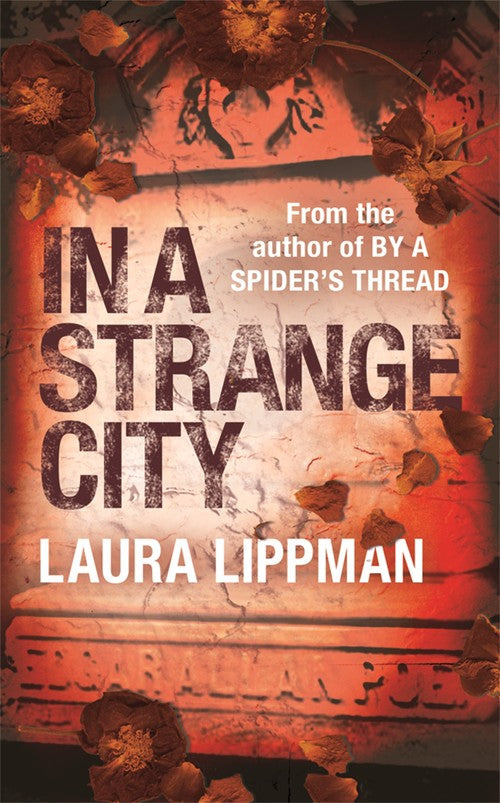 In a Strange City by Laura Lippman
